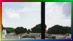 View of a cemetery in Curaçao from the bus window