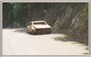 Another burned out car on the road to Marigot Bay