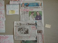 These newspapers were on a bulletin board.