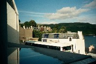 The white building had the only shop that was open on Sunday night.